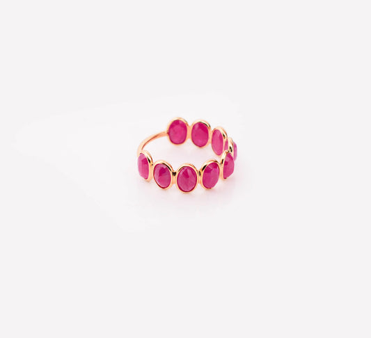 18K gold eternity ring with bezel-set oval-cut rubies