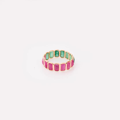 18K gold eternity ring with emerald-cut emerald and ruby stones in a two-tone design